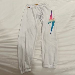 White Aviator Nation sweatpants.